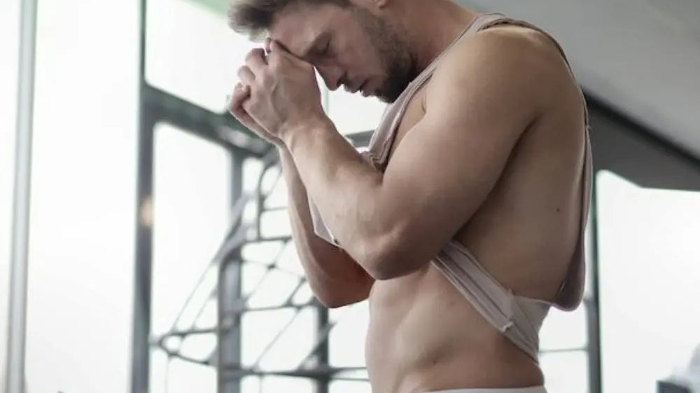 Football player wearing jockstrap with white leggins